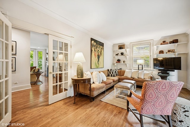 475 Maple St, Winnetka, IL 60093 - living area with french doors, light wood-type flooring, and ornamental molding