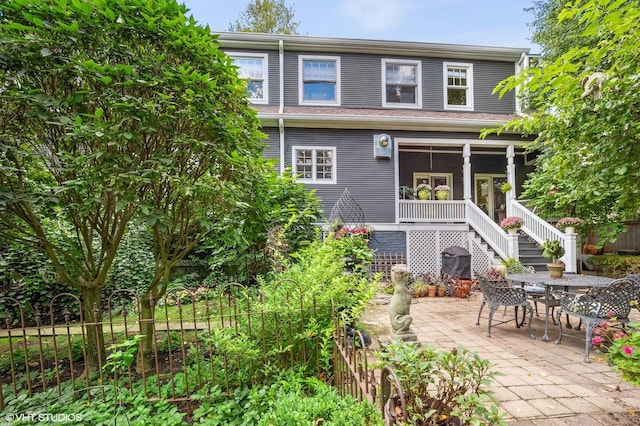 475 Maple St, Winnetka, IL 60093 - rear view of house featuring stairs and a patio