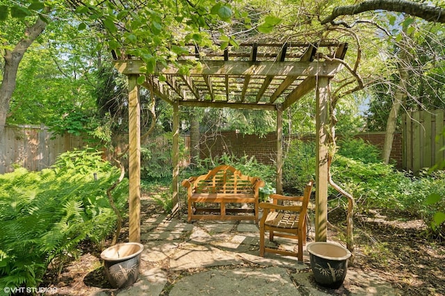 475 Maple St, Winnetka, IL 60093 - fenced backyard with a pergola and a patio area