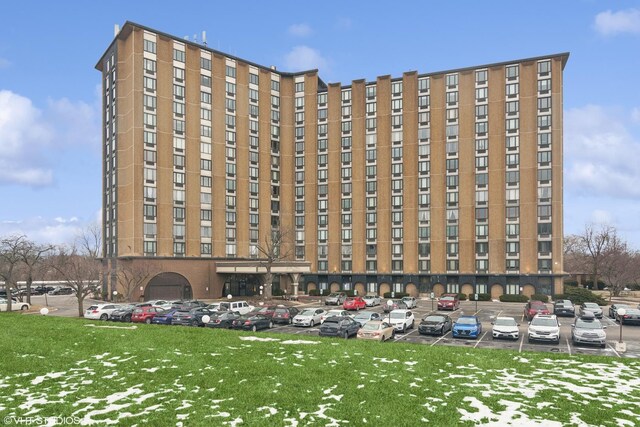 1 Renaissance Pl Unit 1Ph, Palatine, IL 60067 - view of apartment building / complex with uncovered parking