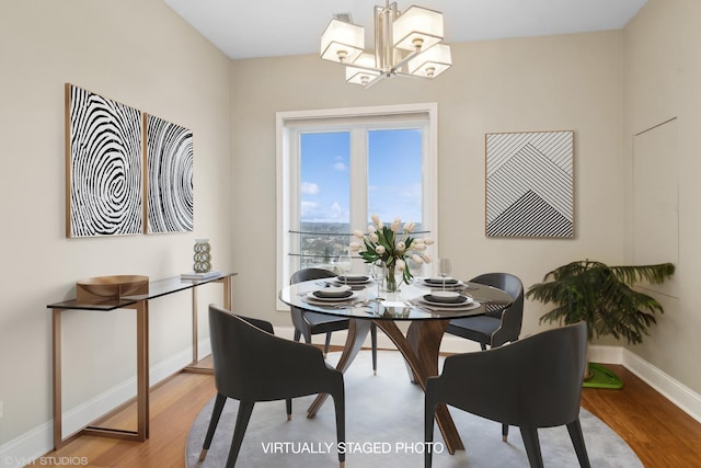 1 Renaissance Pl Unit 1Ph, Palatine, IL 60067 - dining room featuring wood finished floors, baseboards, and a chandelier