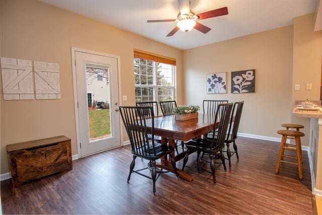 738 Dillon Ct, Grayslake, IL 60030 - dining room with dark wood finished floors, ceiling fan, and baseboards
