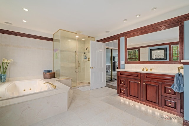 1878 Hackberry Ln, Lake Forest, IL 60045 - bathroom featuring a stall shower, a whirlpool tub, vanity, recessed lighting, and tile patterned floors