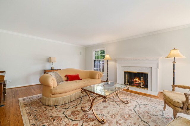 1878 Hackberry Ln, Lake Forest, IL 60045 - living room with crown molding, wood finished floors, a lit fireplace, and baseboards