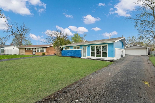1401 Stanley Blvd, Calumet City, IL 60409 - view of front facade with a front yard and a garage