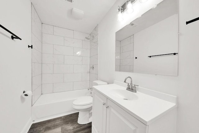 1401 Stanley Blvd, Calumet City, IL 60409 - full bathroom with toilet, wood finished floors, shower / bathing tub combination, and vanity