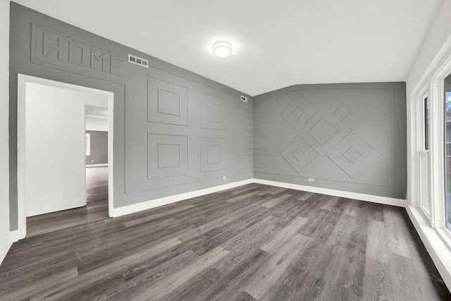 1401 Stanley Blvd, Calumet City, IL 60409 - unfurnished bedroom featuring baseboards, dark wood-style flooring, and visible vents
