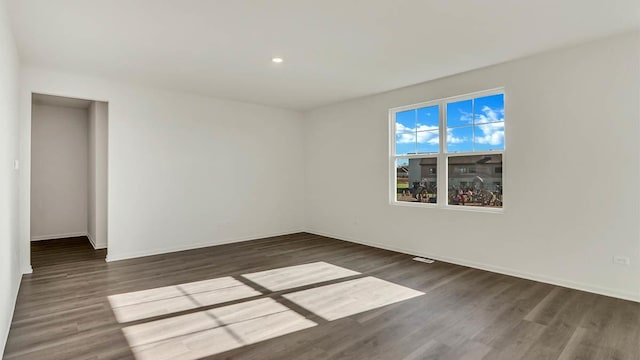 9968 Central Park Blvd, Huntley, IL 60142 - spare room featuring wood finished floors, baseboards, and recessed lighting