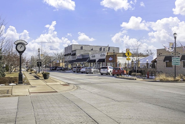 9968 Central Park Blvd, Huntley, IL 60142 - view of asphalt road with sidewalks, street lighting, curbs, and traffic signs