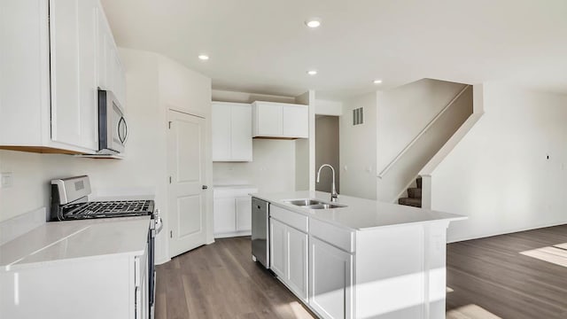 9968 Central Park Blvd, Huntley, IL 60142 - kitchen featuring a sink, stainless steel appliances, dark wood finished floors, white cabinets, and recessed lighting
