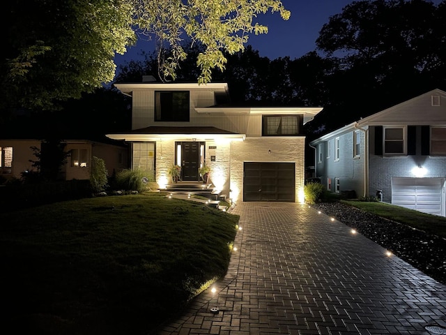 627 Beaver Rd, Glenview, IL 60025 - view of front of property with a garage and decorative driveway