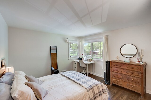 627 Beaver Rd, Glenview, IL 60025 - bedroom with dark wood-style flooring and baseboards