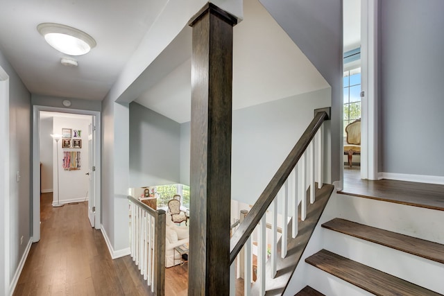 627 Beaver Rd, Glenview, IL 60025 - interior space featuring baseboards, wood finished floors, and an upstairs landing