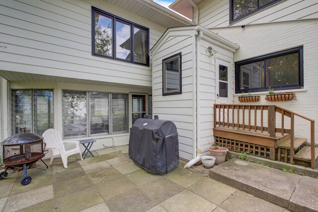 627 Beaver Rd, Glenview, IL 60025 - view of patio / terrace with grilling area and an outdoor fire pit
