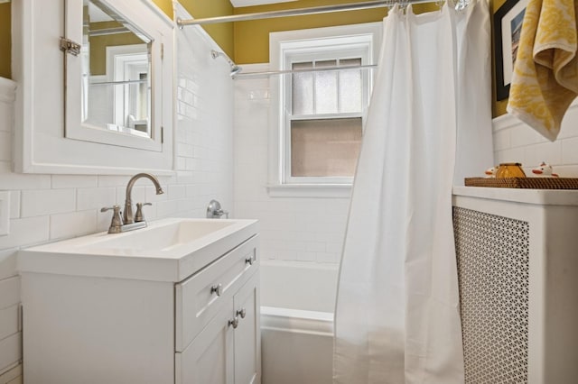 725 Erie St Unit 1D, Oak Park, IL 60302 - bathroom with decorative backsplash, shower / bathtub combination with curtain, vanity, and tile walls