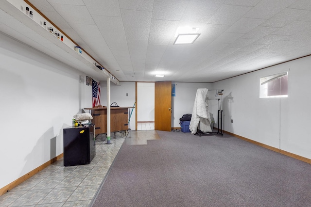 below grade area featuring baseboards