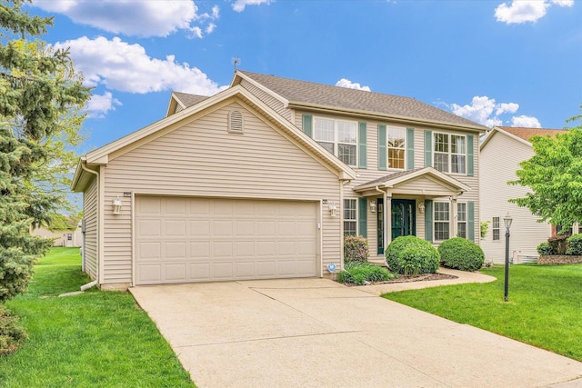 4603 Stonebridge Dr, Champaign, IL 61822 - traditional-style home featuring concrete driveway, a front yard, and a garage