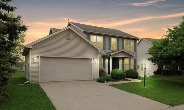 4603 Stonebridge Dr, Champaign, IL 61822 - traditional home featuring a yard, concrete driveway, and an attached garage