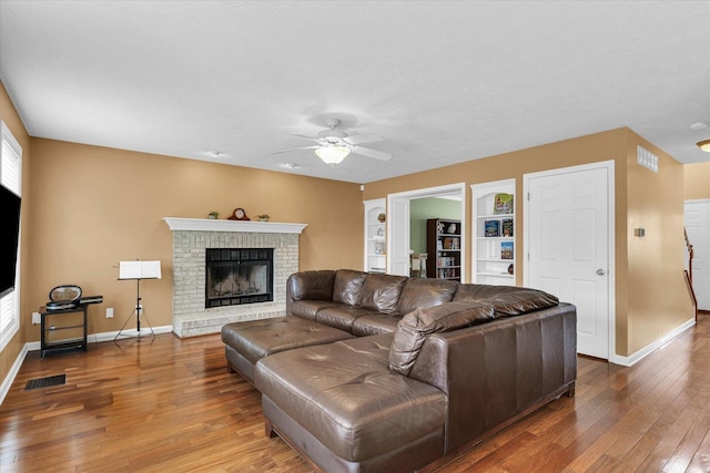 4603 Stonebridge Dr, Champaign, IL 61822 - living area with ceiling fan, wood-type flooring, baseboards, and visible vents