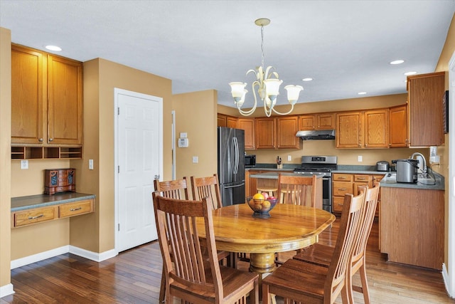 4603 Stonebridge Dr, Champaign, IL 61822 - dining room featuring baseboards, hardwood / wood-style floors, a notable chandelier, and recessed lighting