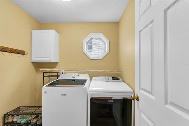4603 Stonebridge Dr, Champaign, IL 61822 - washroom with washing machine and clothes dryer and cabinet space
