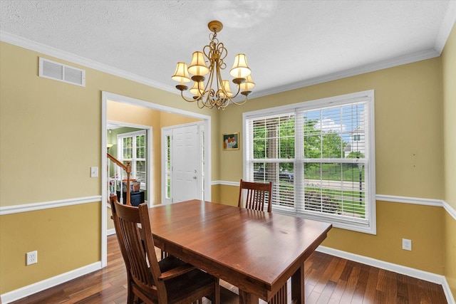 4603 Stonebridge Dr, Champaign, IL 61822 - dining space with baseboards, hardwood / wood-style floors, crown molding, and visible vents