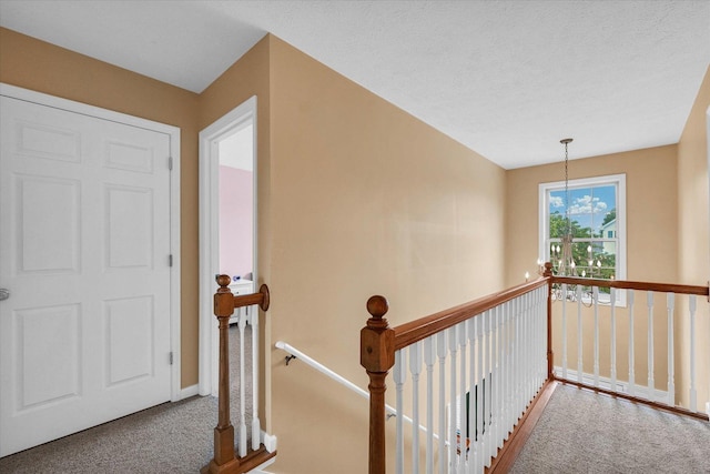 4603 Stonebridge Dr, Champaign, IL 61822 - hall featuring carpet flooring, an upstairs landing, and baseboards