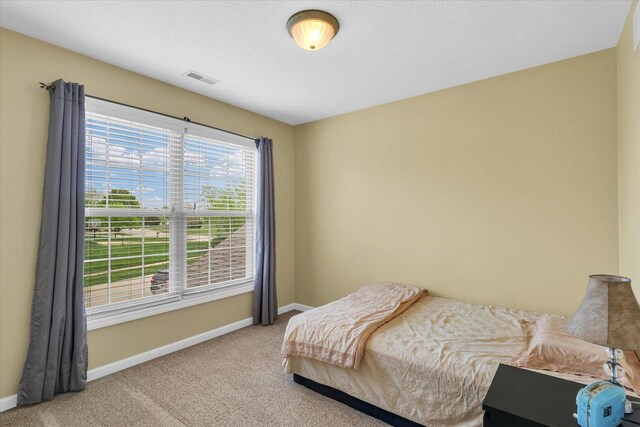 4603 Stonebridge Dr, Champaign, IL 61822 - bedroom with light carpet, baseboards, and visible vents
