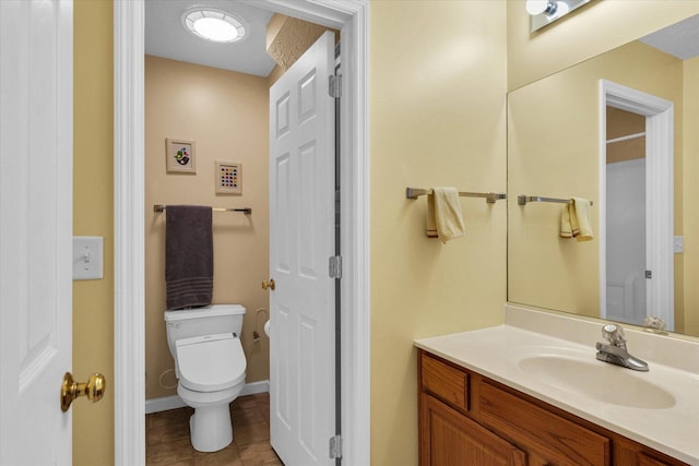 4603 Stonebridge Dr, Champaign, IL 61822 - bathroom featuring toilet, tile patterned flooring, and vanity
