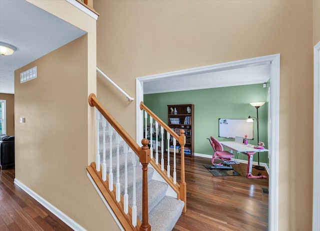 4603 Stonebridge Dr, Champaign, IL 61822 - staircase with visible vents, baseboards, and hardwood / wood-style floors