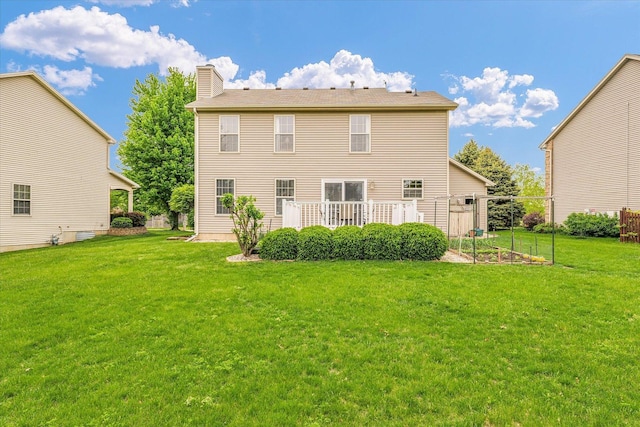 4603 Stonebridge Dr, Champaign, IL 61822 - back of house featuring a chimney and a lawn