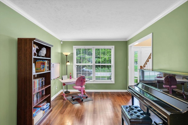 4603 Stonebridge Dr, Champaign, IL 61822 - office with ornamental molding, a textured ceiling, baseboards, and hardwood / wood-style floors