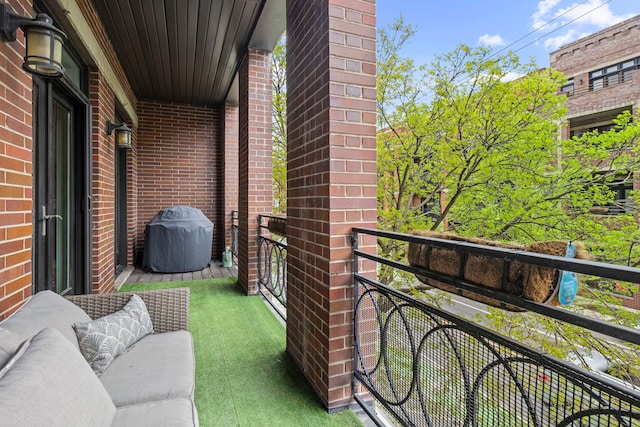 2112 W Belmont Ave Unit 1, Chicago, IL 60618 - balcony with area for grilling and an outdoor hangout area