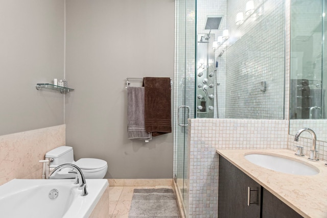 2112 W Belmont Ave Unit 1, Chicago, IL 60618 - bathroom with vanity, toilet, baseboards, a bath, and a stall shower