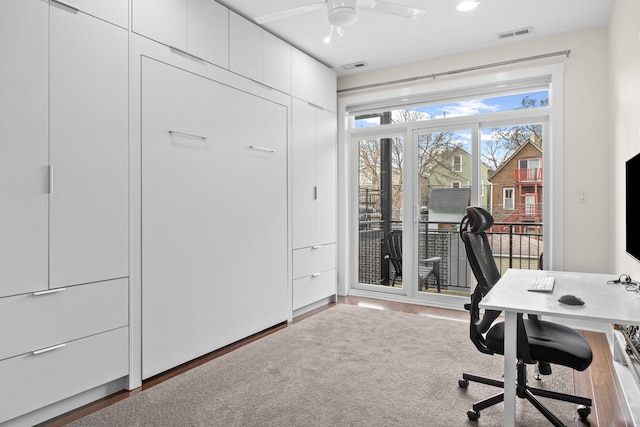 2112 W Belmont Ave Unit 1, Chicago, IL 60618 - office with visible vents, a ceiling fan, and wood finished floors