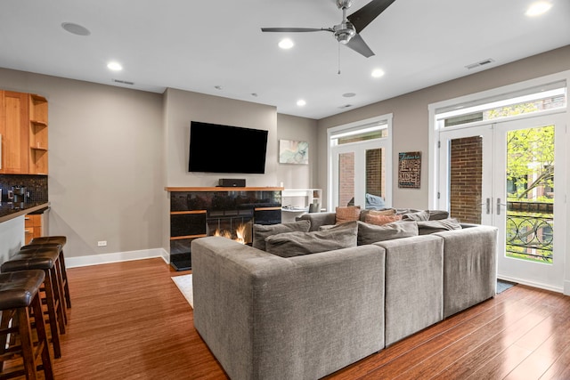 2112 W Belmont Ave Unit 1, Chicago, IL 60618 - living room with ceiling fan, visible vents, baseboards, recessed lighting, and dark wood-type flooring