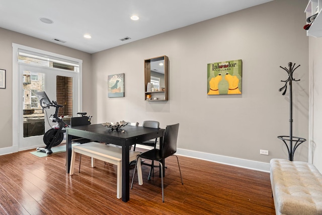 2112 W Belmont Ave Unit 1, Chicago, IL 60618 - dining area featuring baseboards, recessed lighting, wood finished floors, and visible vents