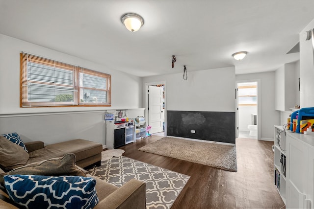 living room with wood finished floors