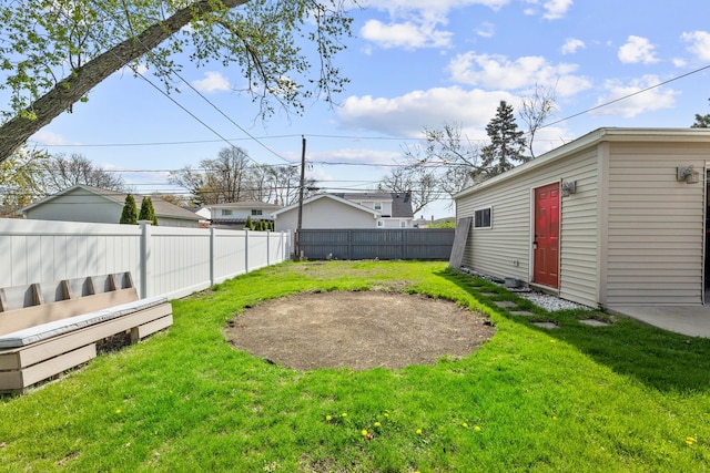 view of yard featuring a fenced backyard
