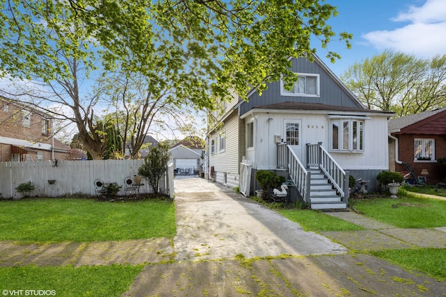 3610 Lombard Ave, Berwyn, IL 60402 - bungalow-style house with an outbuilding and a garage