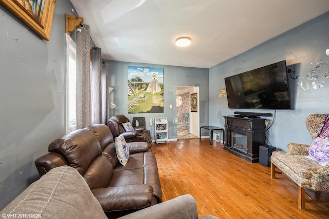 3610 Lombard Ave, Berwyn, IL 60402 - living room with wood-type flooring and a glass covered fireplace