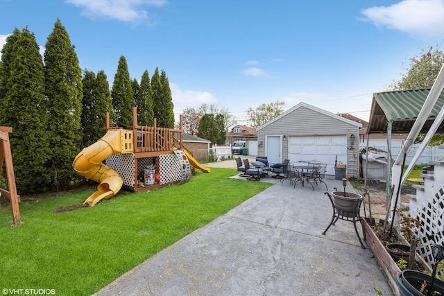 3610 Lombard Ave, Berwyn, IL 60402 - view of yard featuring a playground, a garage, a patio area, and an outdoor structure