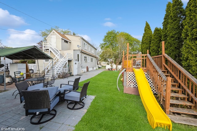 3610 Lombard Ave, Berwyn, IL 60402 - view of home's community featuring a playground, stairs, a yard, and a patio area