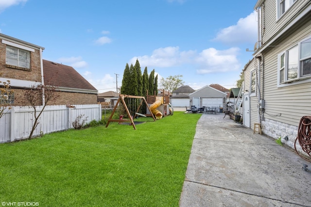 3610 Lombard Ave, Berwyn, IL 60402 - view of yard featuring a playground, an outbuilding, and a patio