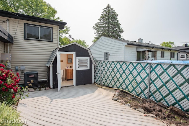 838 S Michigan Ave, Addison, IL 60101 - wooden terrace featuring a storage unit