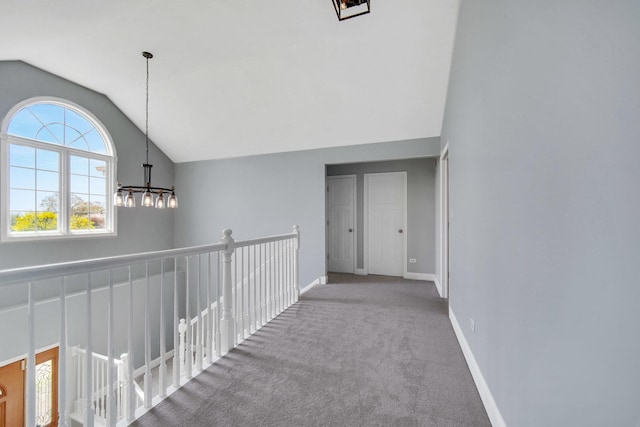 1075 Grand Mesa Ave, New Lenox, IL 60451 - hall with vaulted ceiling, carpet floors, baseboards, an upstairs landing, and an inviting chandelier