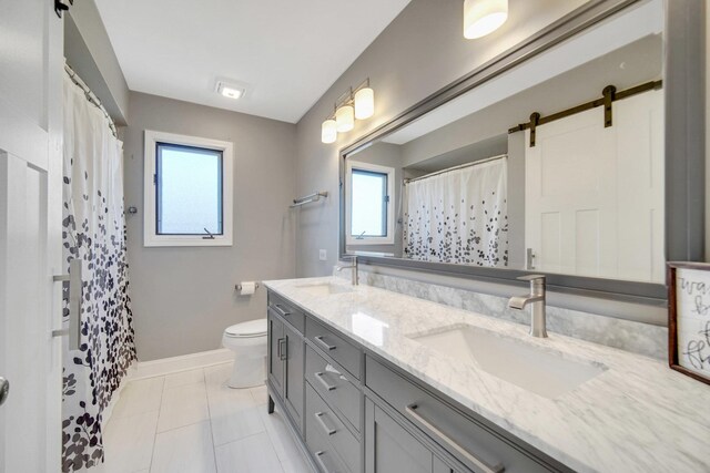 1075 Grand Mesa Ave, New Lenox, IL 60451 - bathroom with baseboards, a sink, and a wealth of natural light