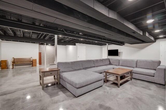 1075 Grand Mesa Ave, New Lenox, IL 60451 - living area featuring finished concrete flooring and visible vents