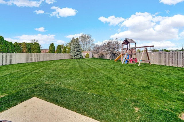1075 Grand Mesa Ave, New Lenox, IL 60451 - view of yard featuring a fenced backyard and a playground