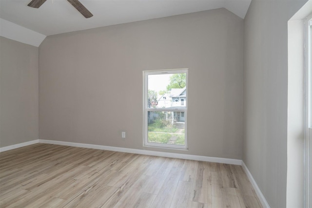 510 E Washington St, Pontiac, IL 61764 - spare room with baseboards, light wood-type flooring, a ceiling fan, and lofted ceiling